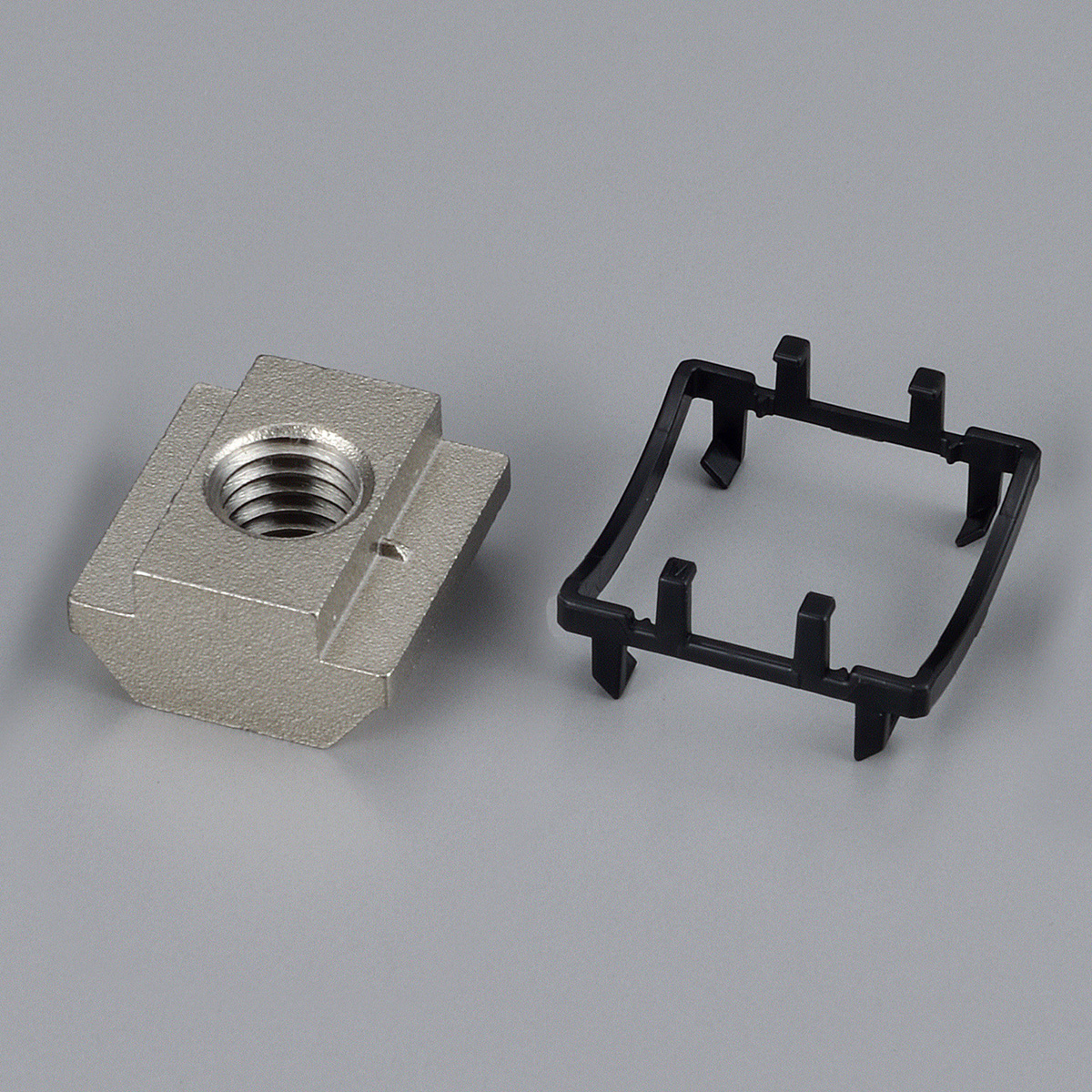 STナットL　M6　スベリ止めキャップ付